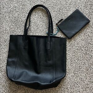 J. Crew Black Leather Carry All Tote with zippered pouch.